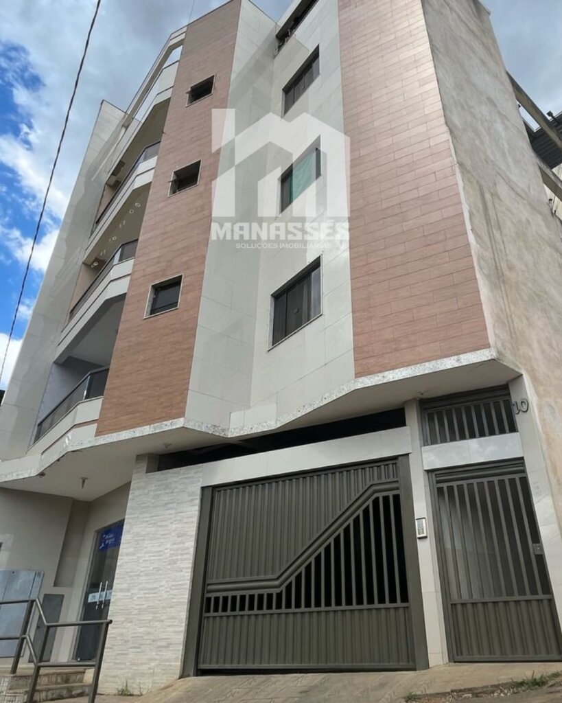 Destaque para portão do prédio à venda em Vila Nova Mg