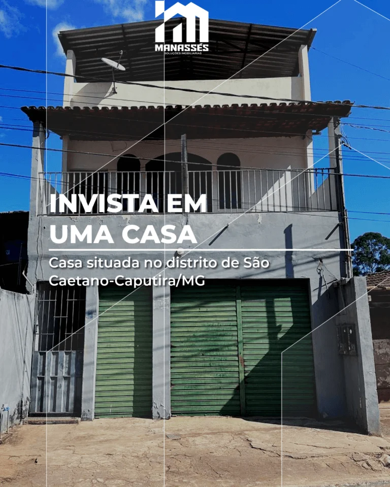 Casa com ponto comercial à venda no distrito de São Caetano, Caputira/MG, fachada com sacada, portões verdes e cobertura ampla.